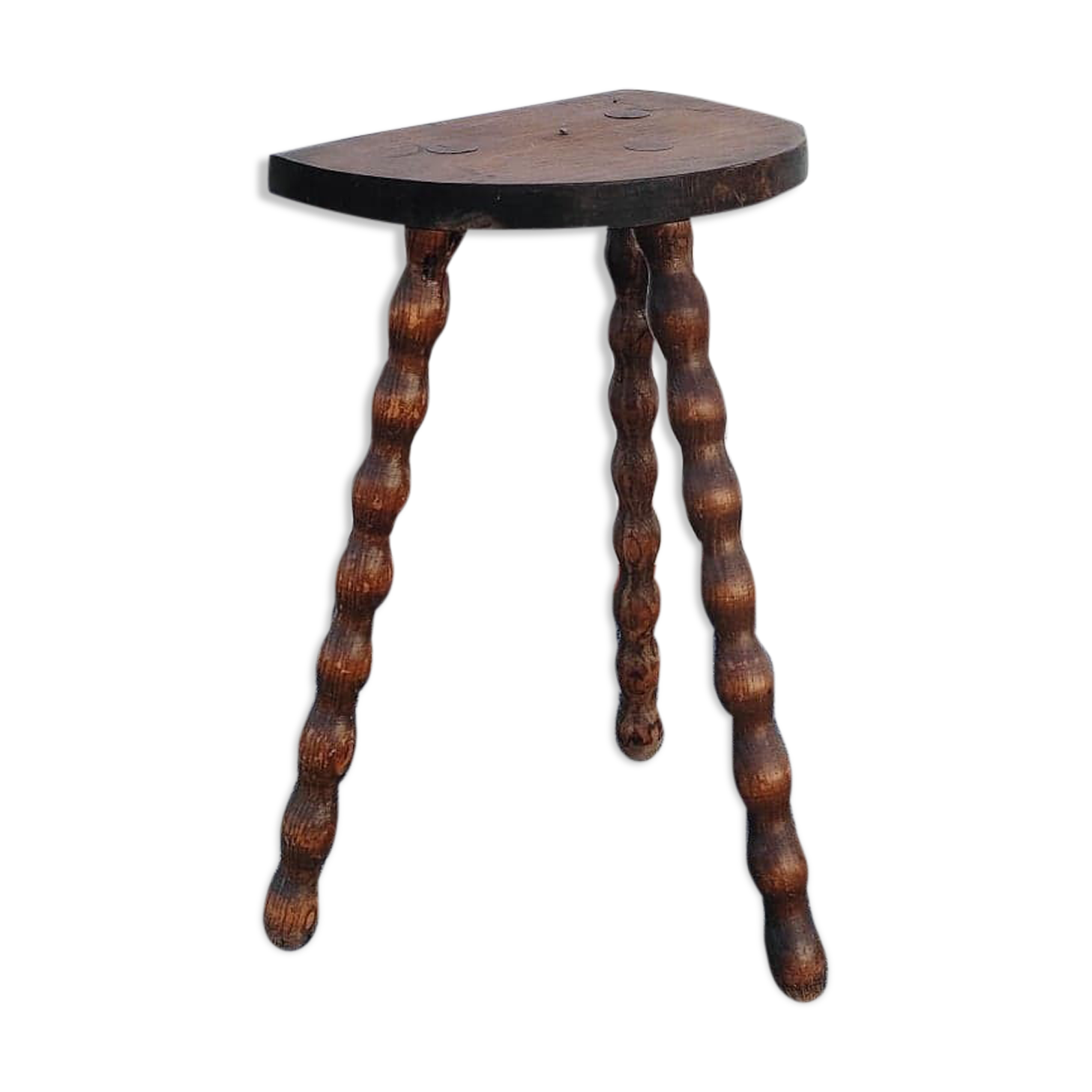 Pretty wooden stool with half moon seat and turned wooden tripod base