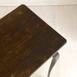 Side table with curved legs