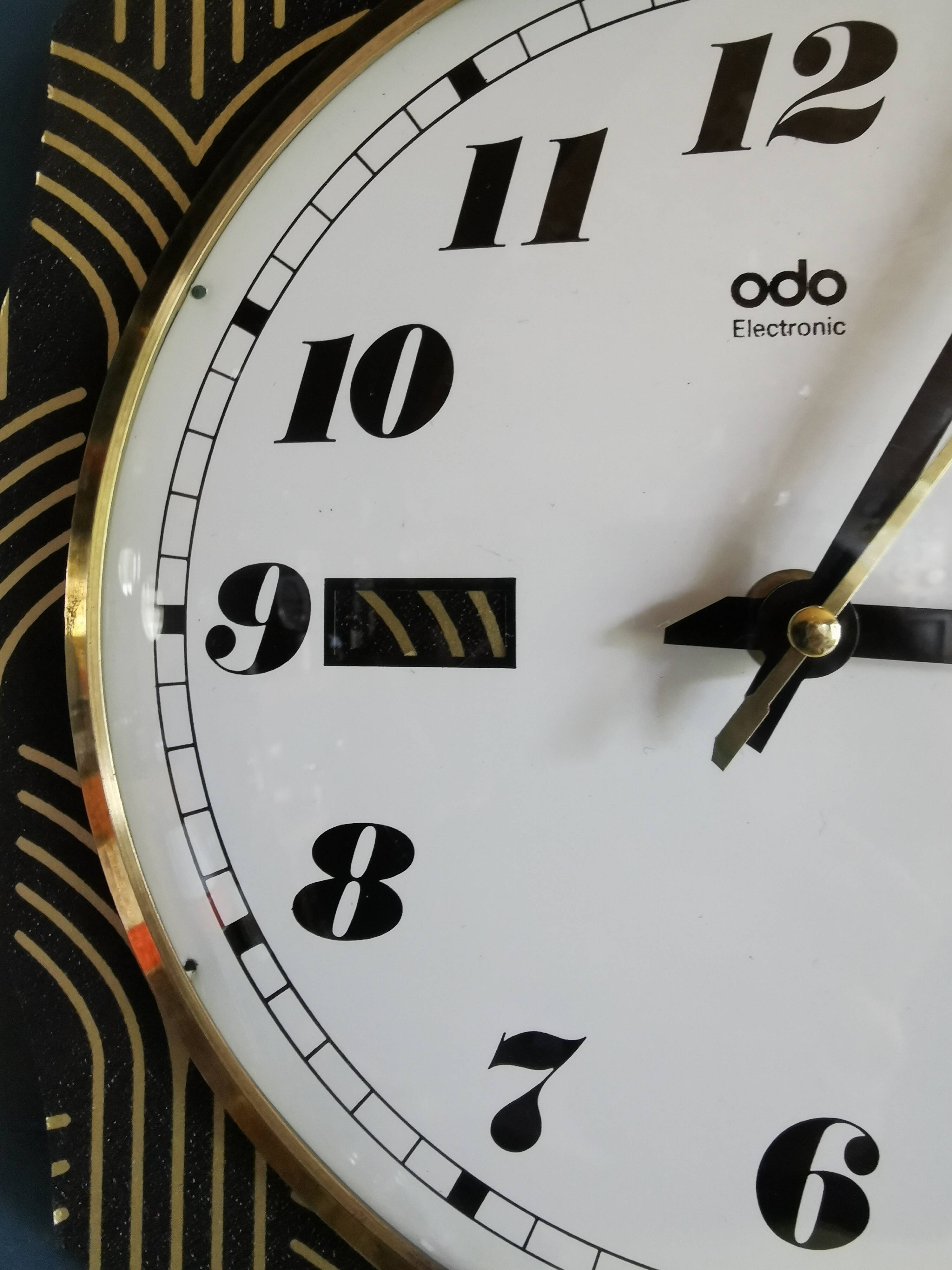 Vintage formica clock silent wall pendulum "Odo black gold"