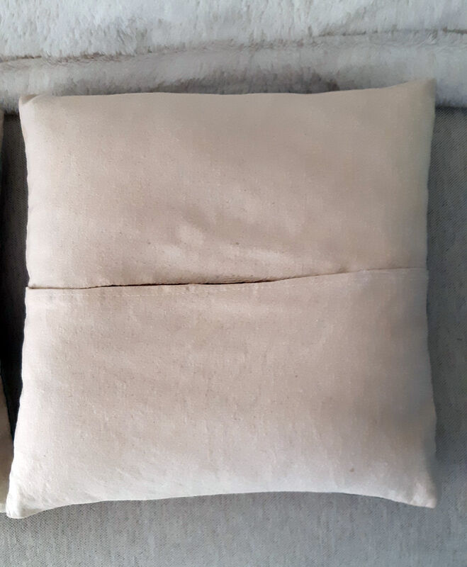 Set of three old hand-embroidered wool cushions
