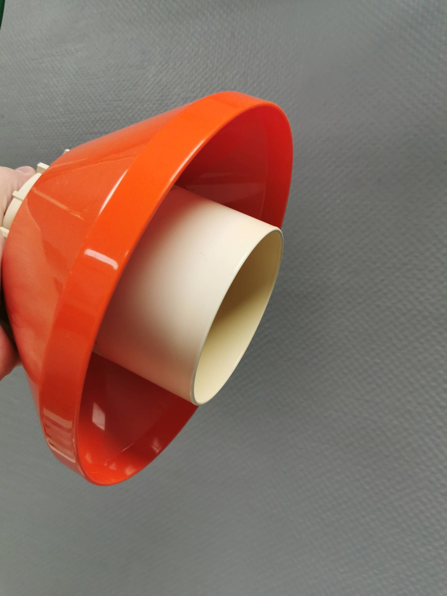 An orange pendant lamp made from hard-pressed ABS plastic. Denmark 1970s