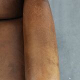 Sheepskin wingback armchair with beautiful colours in good condition