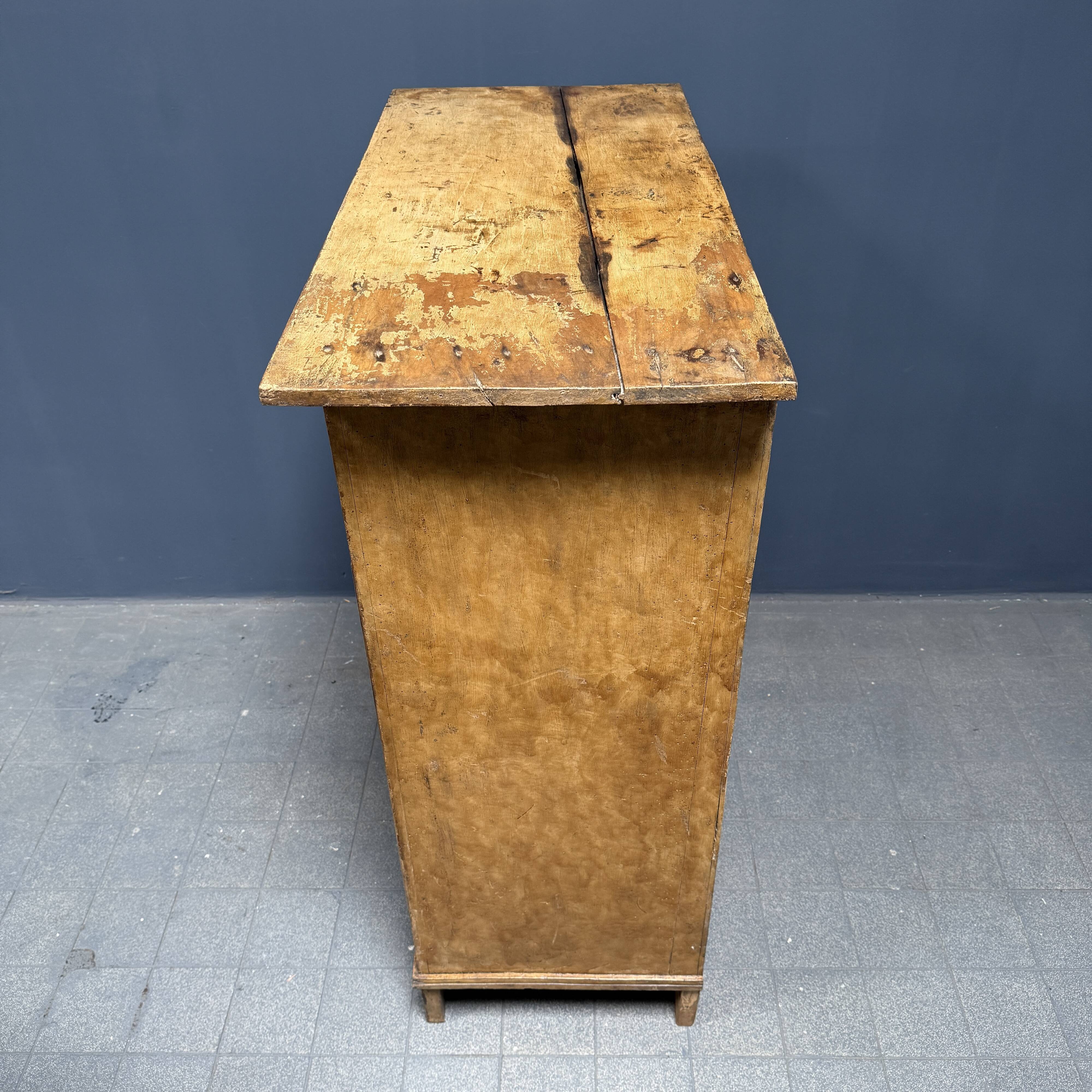 Old marbled ochre yellow French farmhouse cabinet