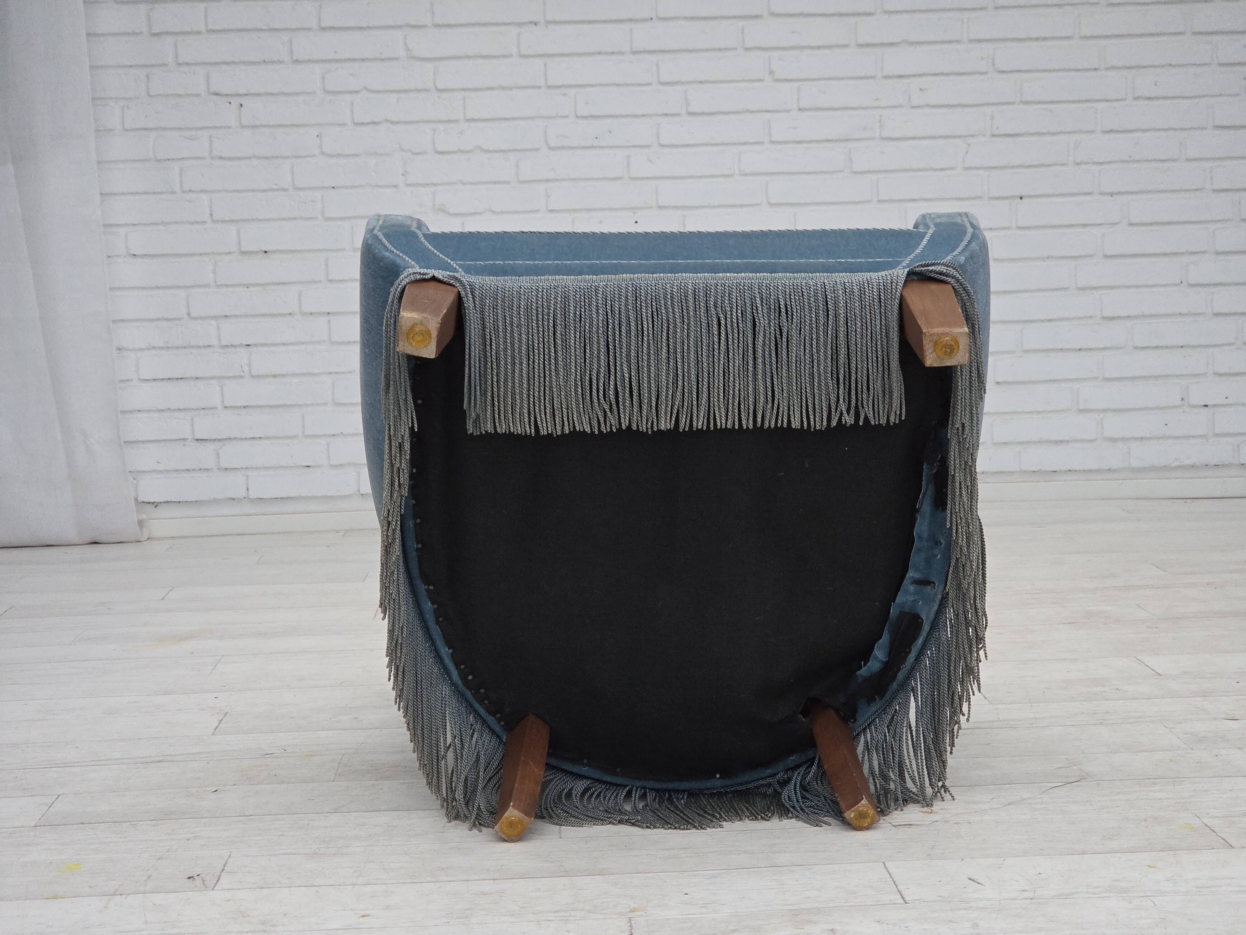 1970s, Danish armchair with footstool, blue furniture velour, oak wood legs