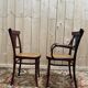 Suite de 4 chaises et deux fauteuils cannés thonet à "palmettes"