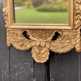 Miroir en bois sculpté doré XIXème siècle 37x91cm