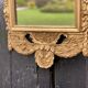Miroir en bois sculpté doré XIXème siècle 37x91cm