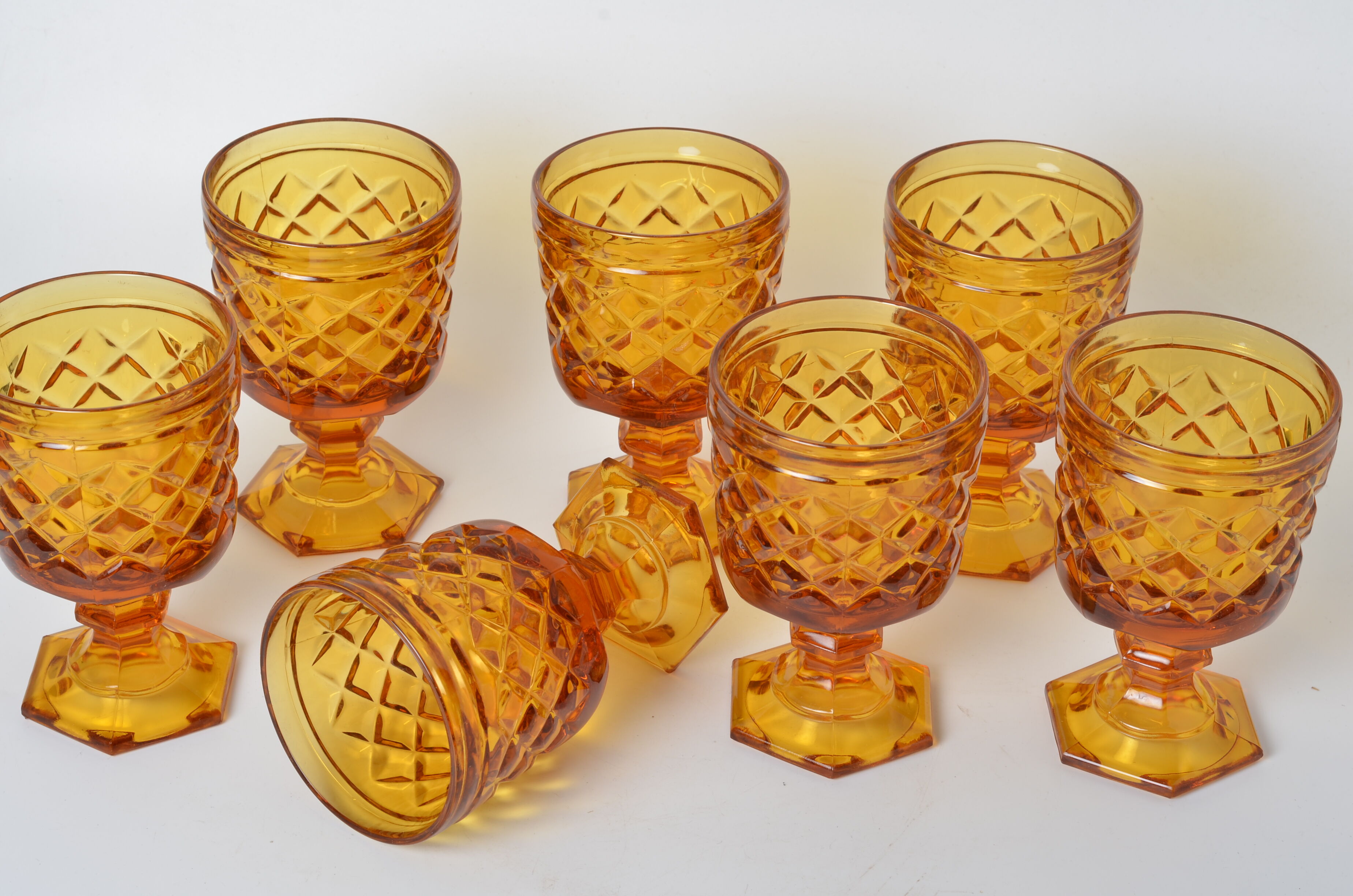7 amber stemmed glasses