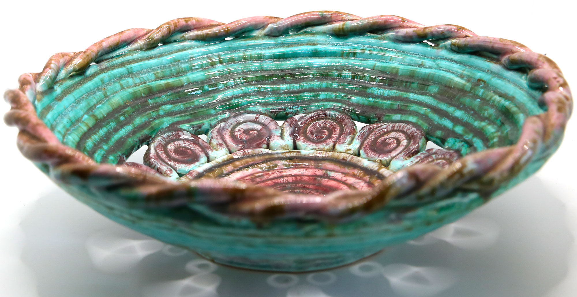 Vintage XL dish in openwork slurry with blue-green and old pink spirals