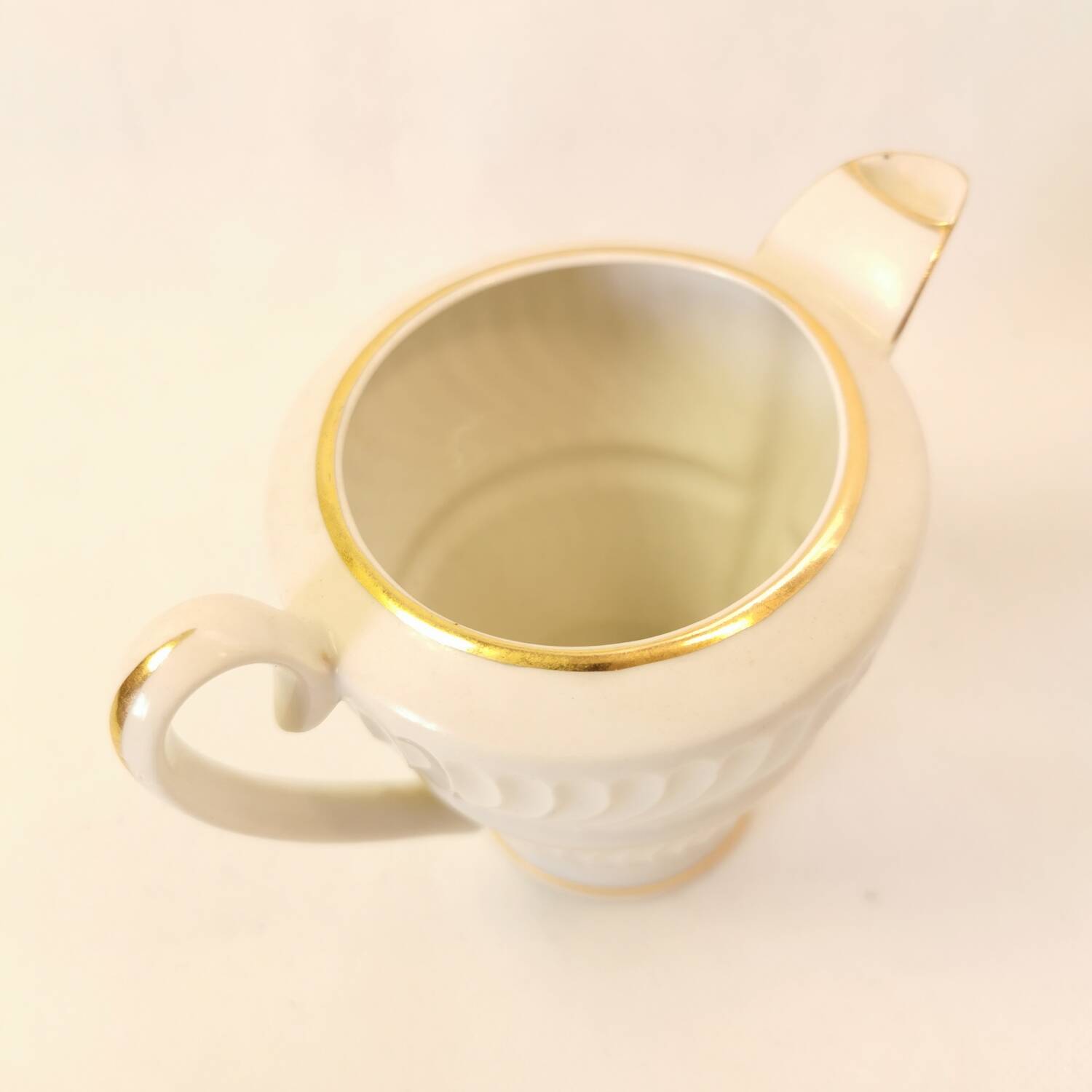 art deco porcelain milk jug with gold edging
