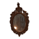 Italian mirror in gilded scupted wood