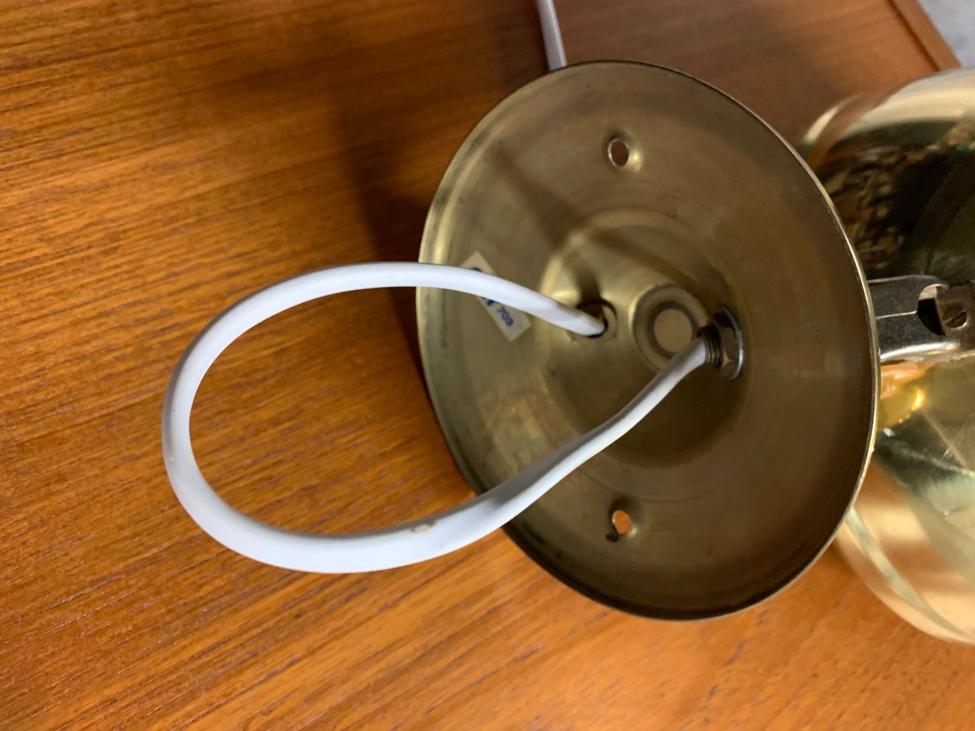 Pair of Danish brass wall lamps by Knud Christensen 1970