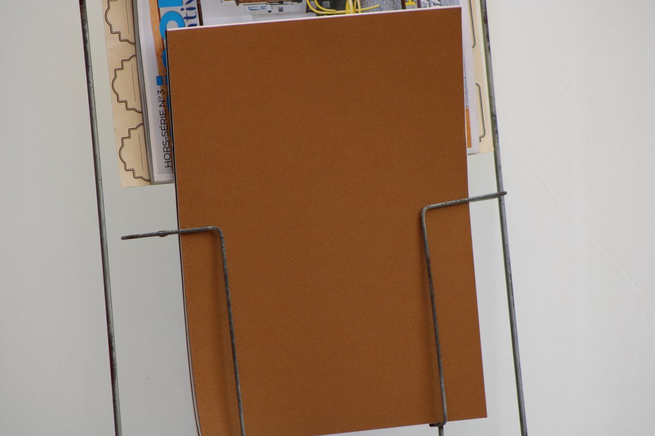Former metal newspaper display