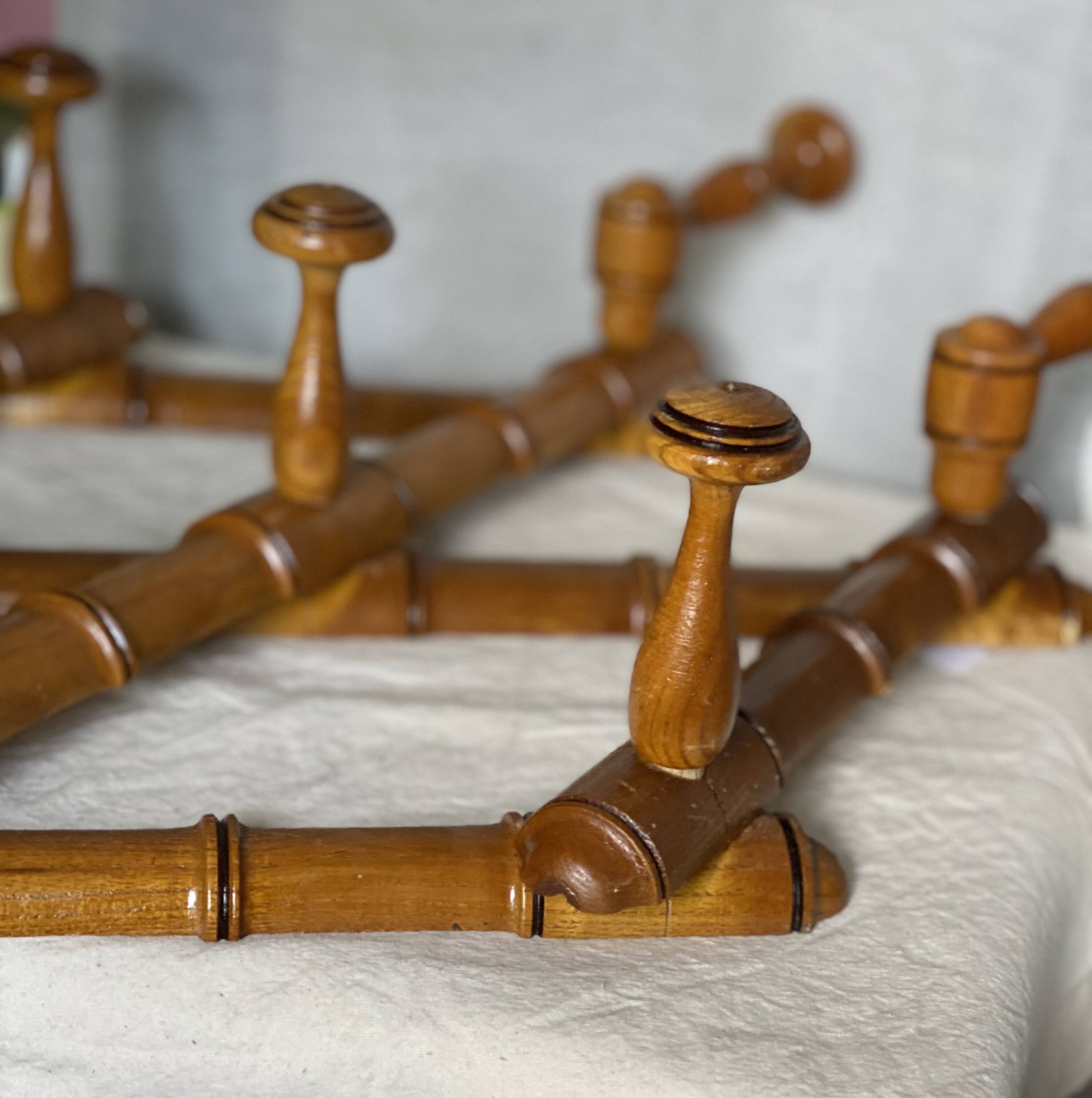 19th century turned wood accordion coat rack.