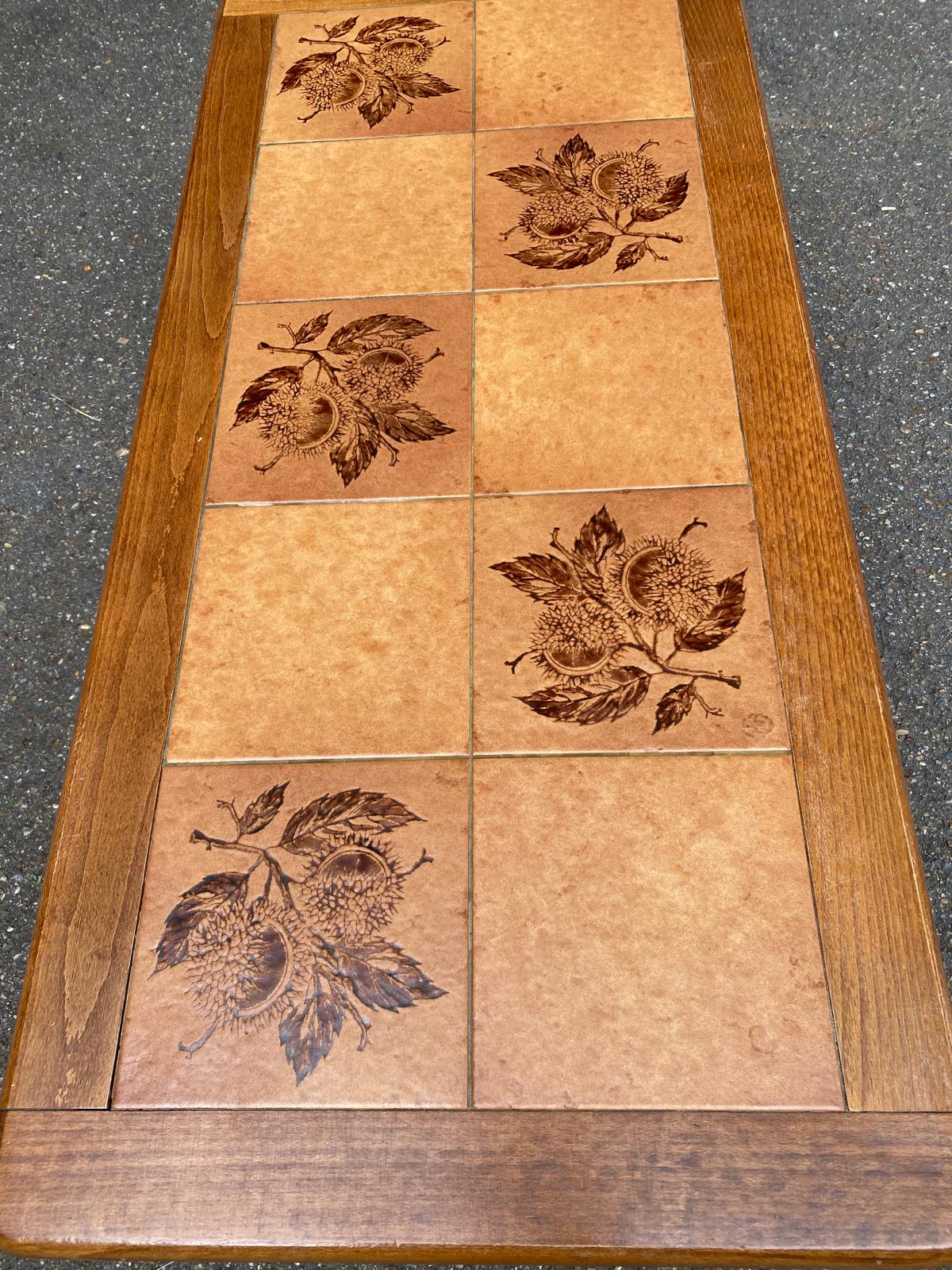 Solid wood and ceramic coffee table from the 1970s.