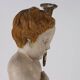 Ancient sculpture of a putto in carved and gilded wood, Italy, 19th century.