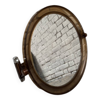 Round brown plastic mirror, 1970-1980