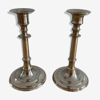 2 silver metal candlesticks