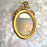 Antique oval mirror from the 20th century