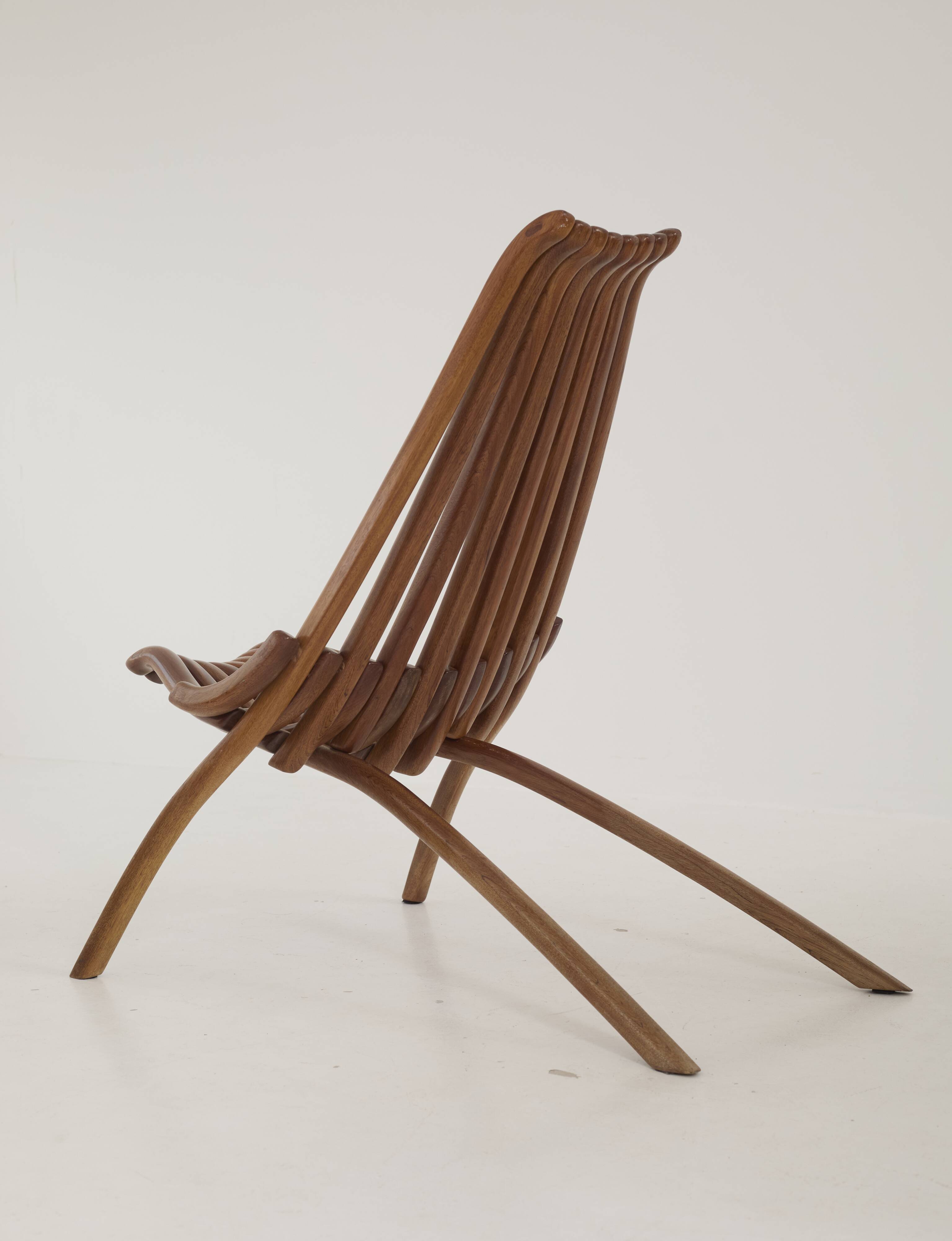 Handcrafted folding chair in solid wood (Iroko) vintage circa 1970.