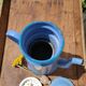 Blue coffee maker in vintage enamelled sheet metal