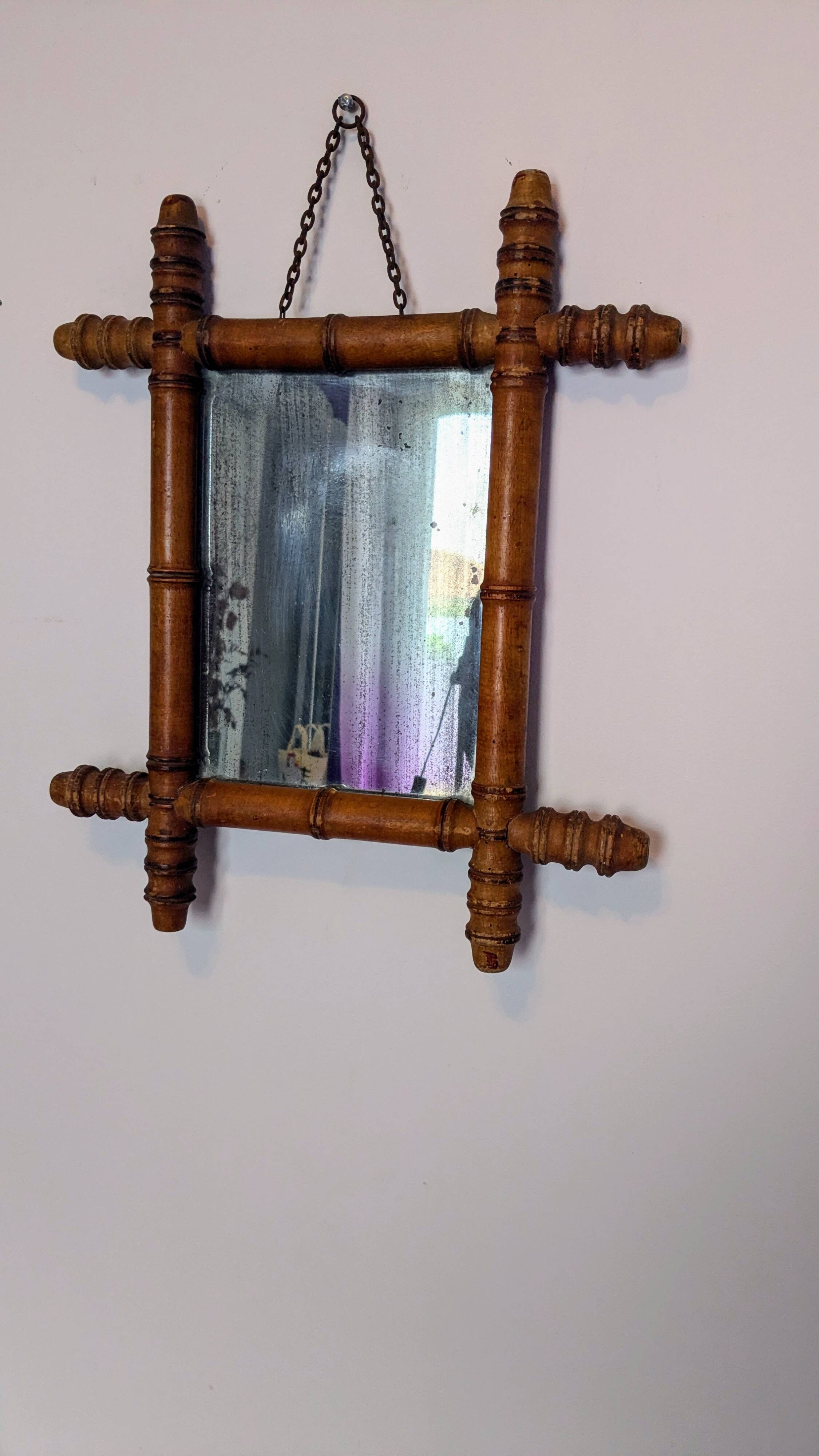 Antique bamboo mirror with pitted glass 40x34 cm