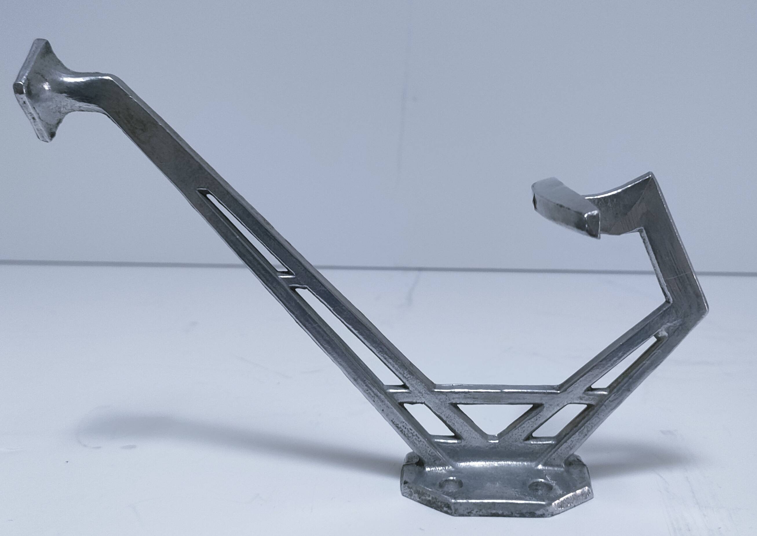 Three brass, chrome, aluminum hooks, early 20th century