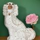Pair of Staffordshire-type dogs in white and gold ceramic