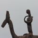 Hand-forged Dogon tribal figurine from naive East Africa.