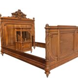 Louis XVI style walnut bed and bedside table