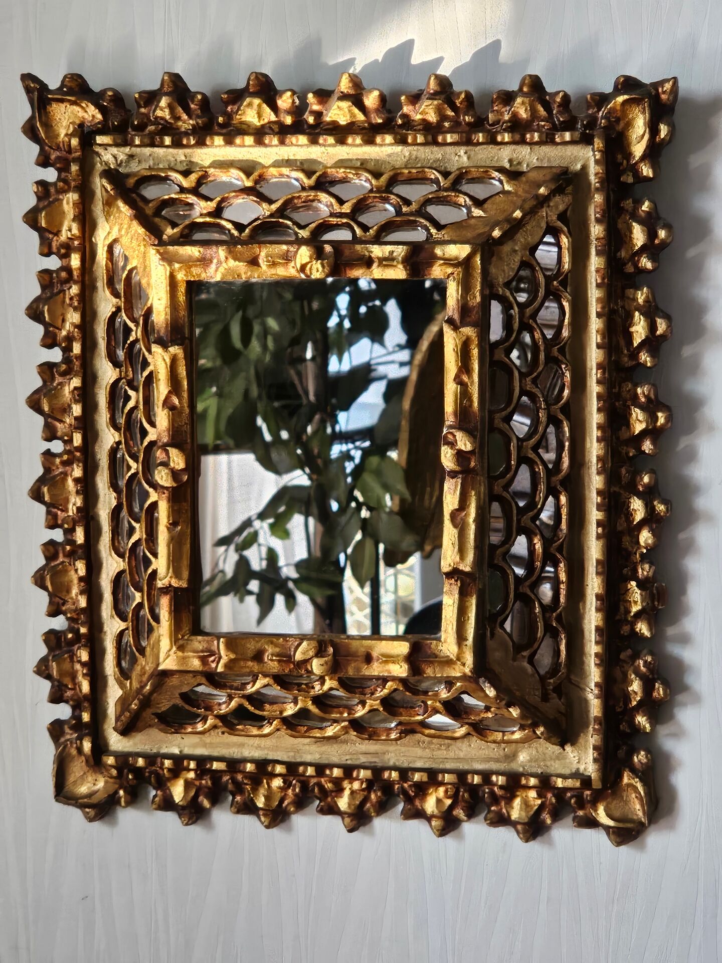 Vintage ethnic mirror, handcrafted golden wood, 1950.