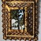 Vintage ethnic mirror, handcrafted golden wood, 1950.