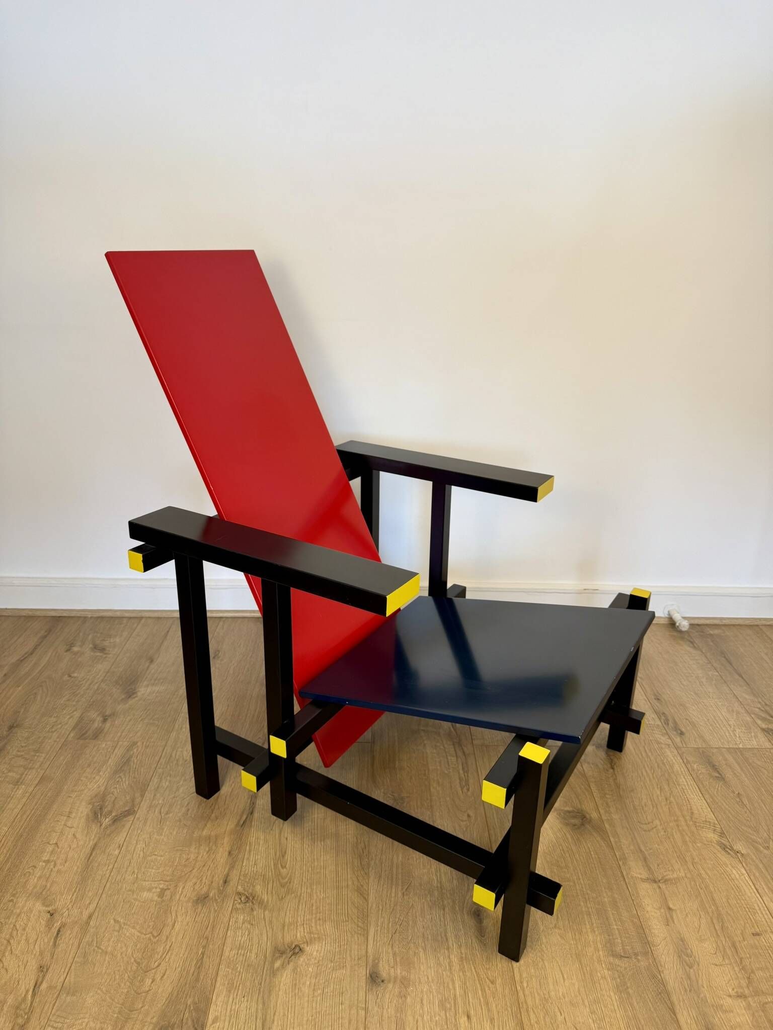Red and Blue Chair in the Style of Gerrit Rietveld – De Stijl Movement