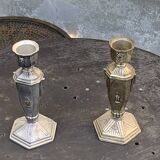 Pair of metal candlesticks, chiseled with a statuette in front, rose pattern in relief, art deco