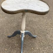 Pair of marble and ivory tripod pedestal tables