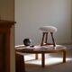 Modern Danish, a pair of tripod stools, seats reupholstered in lambswool, 1950s.