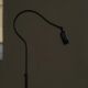 Danish wrought iron floor lamp from the mid-20th century with a curved arm, 1950s.