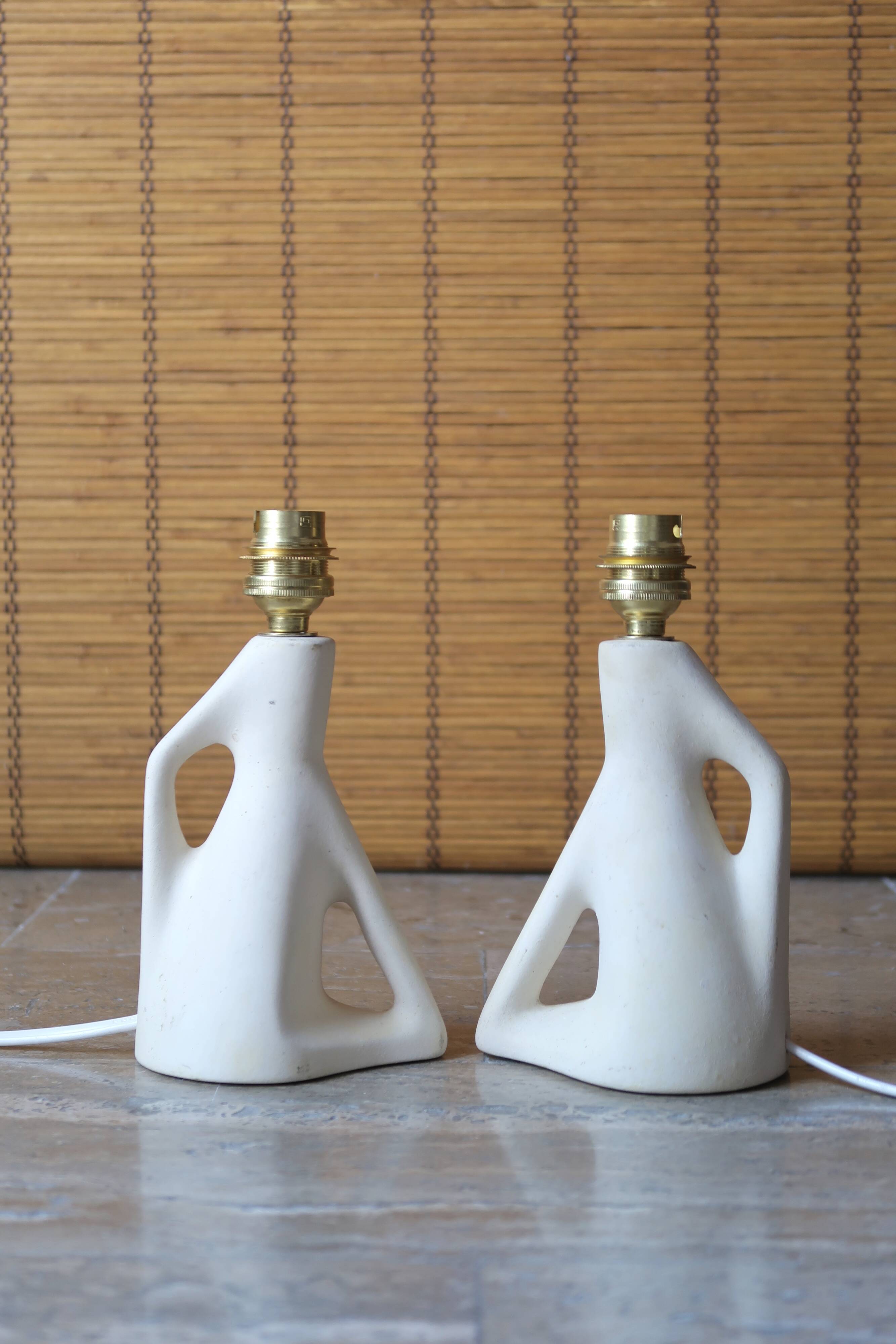 Pair of white ceramic lamps, 50s