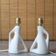 Pair of white ceramic lamps, 50s
