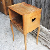 Old wooden bedside table heart pattern