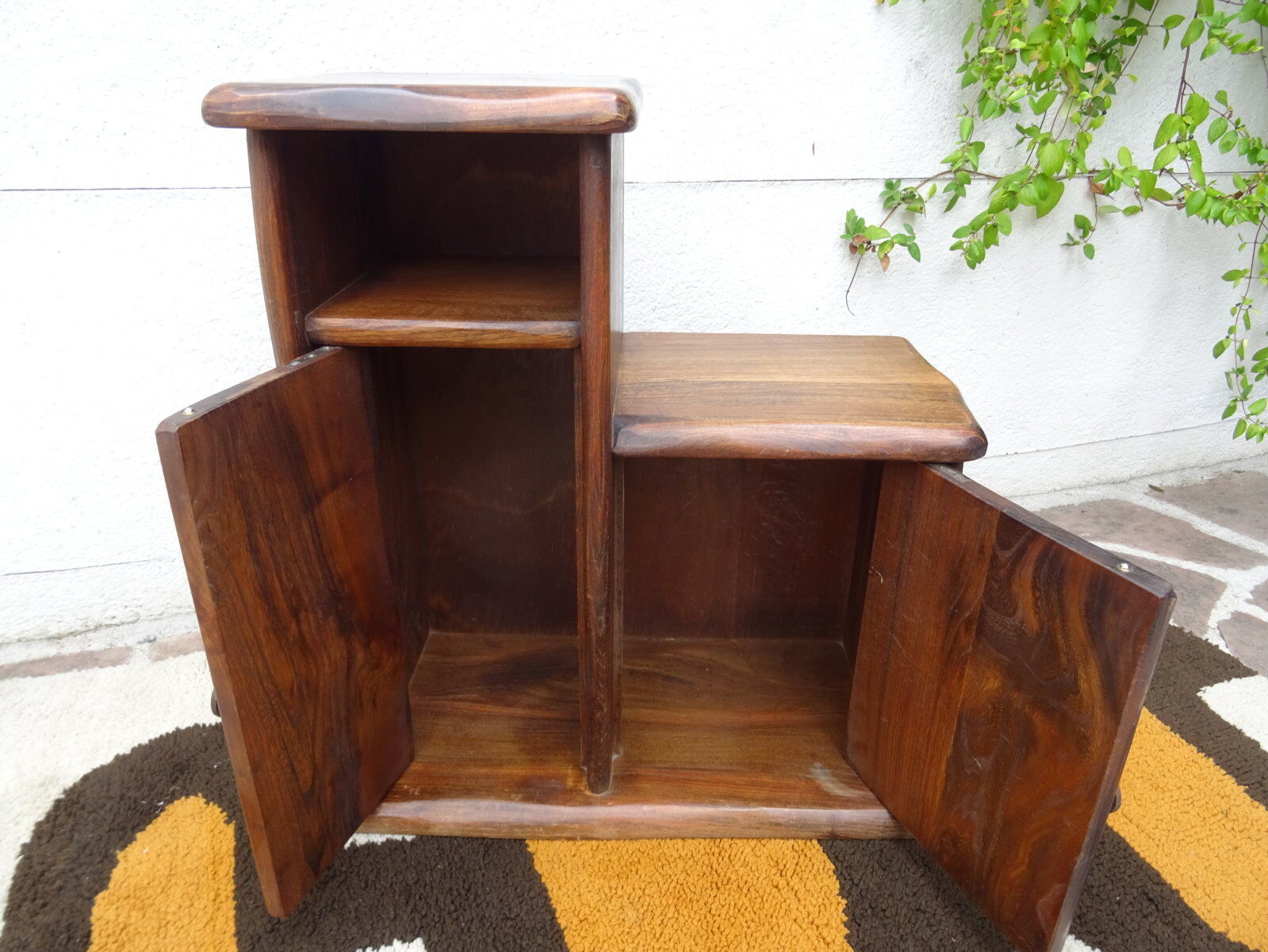 Asymmetrical brutalist furniture in solid elm
