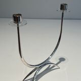 Silver-plated metal and plexiglass design candlestick.