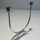 Silver-plated metal and plexiglass design candlestick.