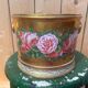 Cache-pot porcelain from Paris, rose decoration on a golden background, Empire style.