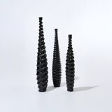 Set of 3 large black vases made of wood and black lacquered.