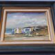 Antique oil painting depicting a seaside scene