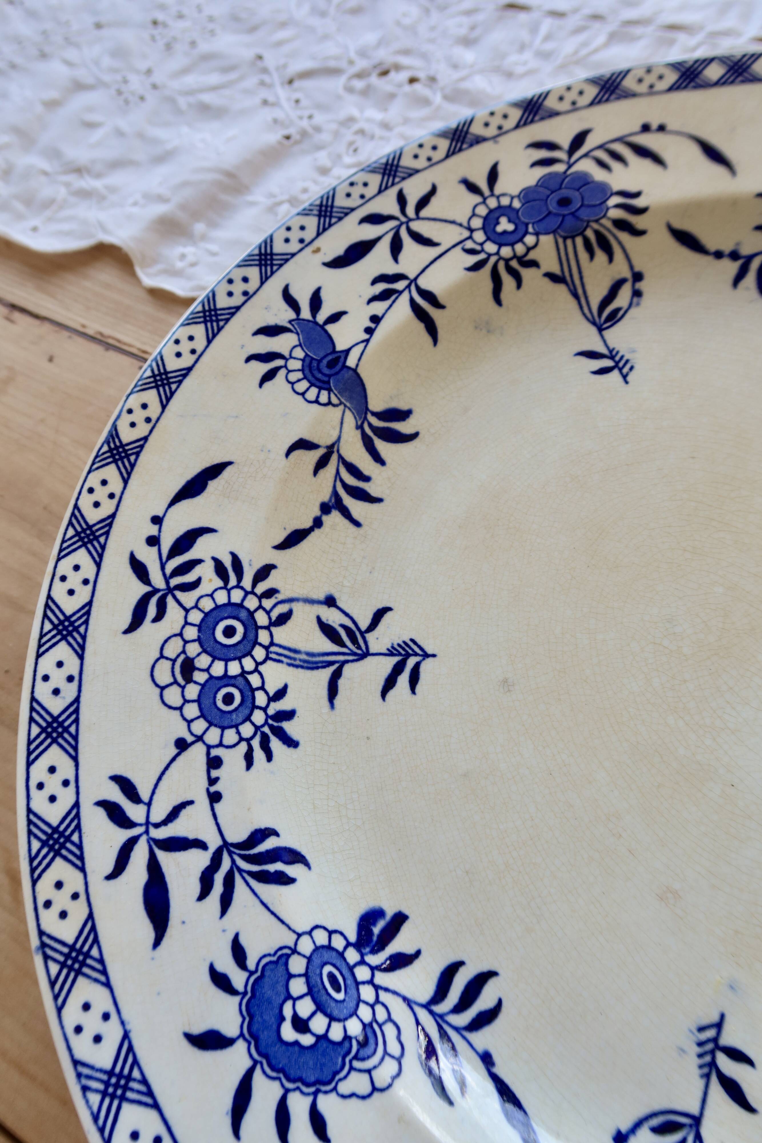 Large round antique plate, blue and white Dresden porcelain.