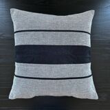 Woven striped cushion
