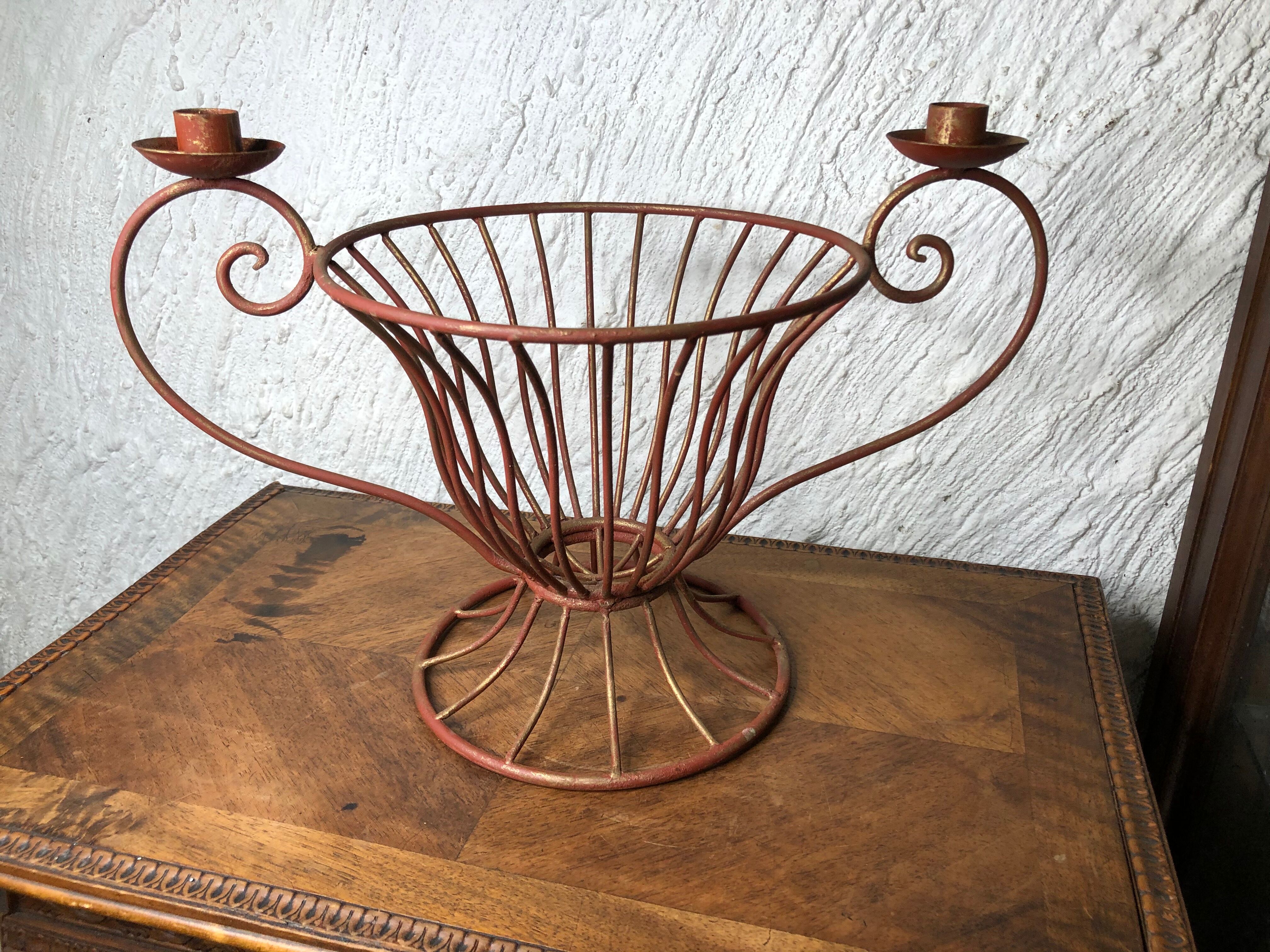 Metal basket with candlesticks