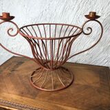 Metal basket with candlesticks